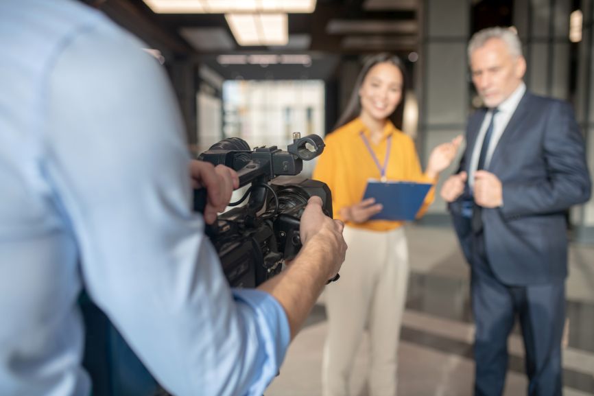 filming an interview during a corporate video production shoot
